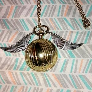 Golden Snitch Locket Watch from Hot Topic